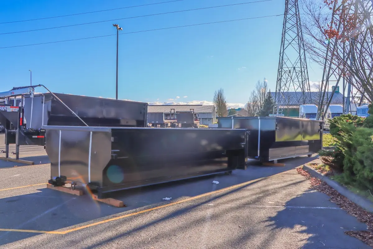Roll-off dumpster ready for waste disposal at job site for Construction Dumpster Rental in Burlington